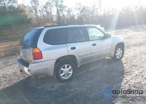 2004 GMC Envoy Sle z USA, uszkodzony, nr VIN 1GKDS13S042297056